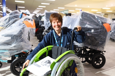 Staff member working with a wheelchair