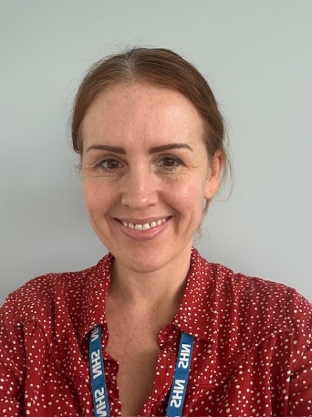 A headshot of Hannah