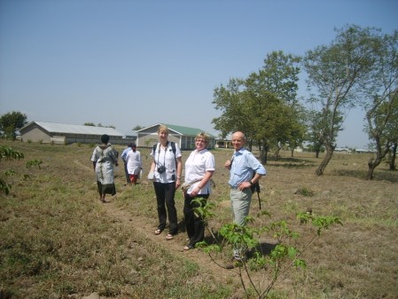 A line of people stood in a field.