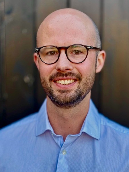 A headshot of Charles Johnson