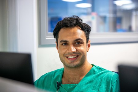 Amil, male doctor at his computer desk (Northumbria Healthcare NHS Foundation Trust)