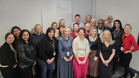 A group of people stood together.