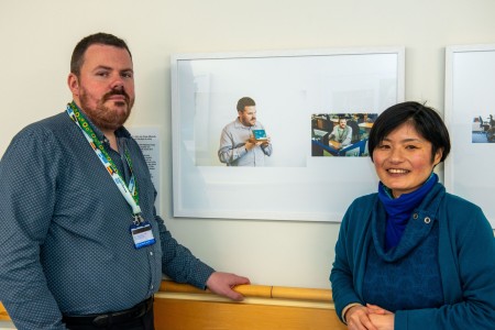 Picture of Northumrbia Healthcare staff member, Ross Punton, beside photographer Ikuko Tsuchiya.